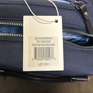 Lo and Sons The Rowledge Deep navy exterior silverhardware and blue interior